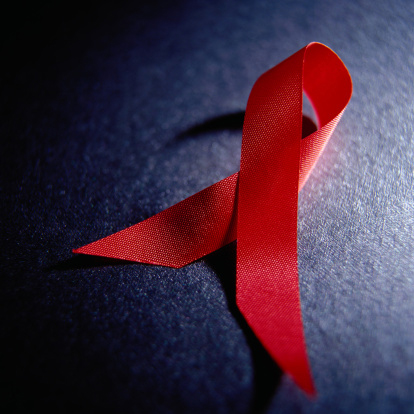 Red ribbon representing HIV/AIDS awareness