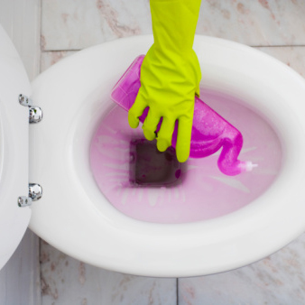 Image of toilet with cleaning detergent.