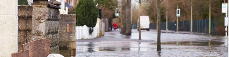 sandbags-outside-house-on-flooded-road-picture-id469051362.jpg
