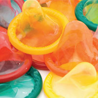 Multiple different coloured condoms.